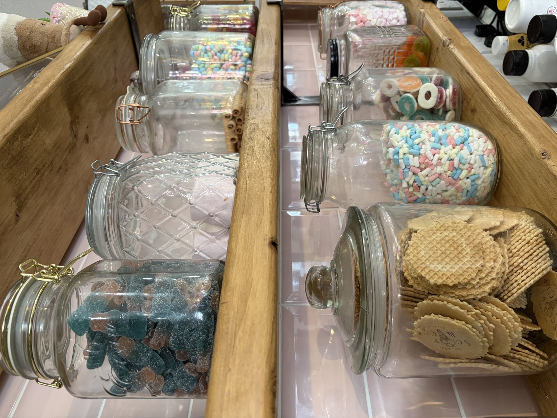 Sweet jars on shelves at Scoop & Cup